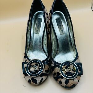 Steve Madden Trea-P leopard print lwedge heel with a round toe & buckle accent